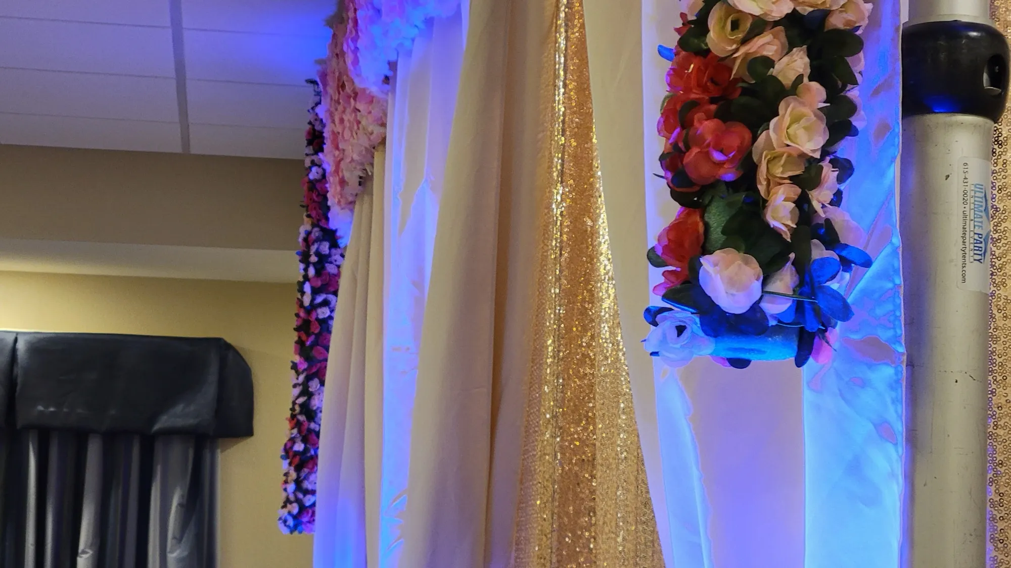 Drape detail sequin floral garland — Sequin Drapes & Red Loveseat Reception