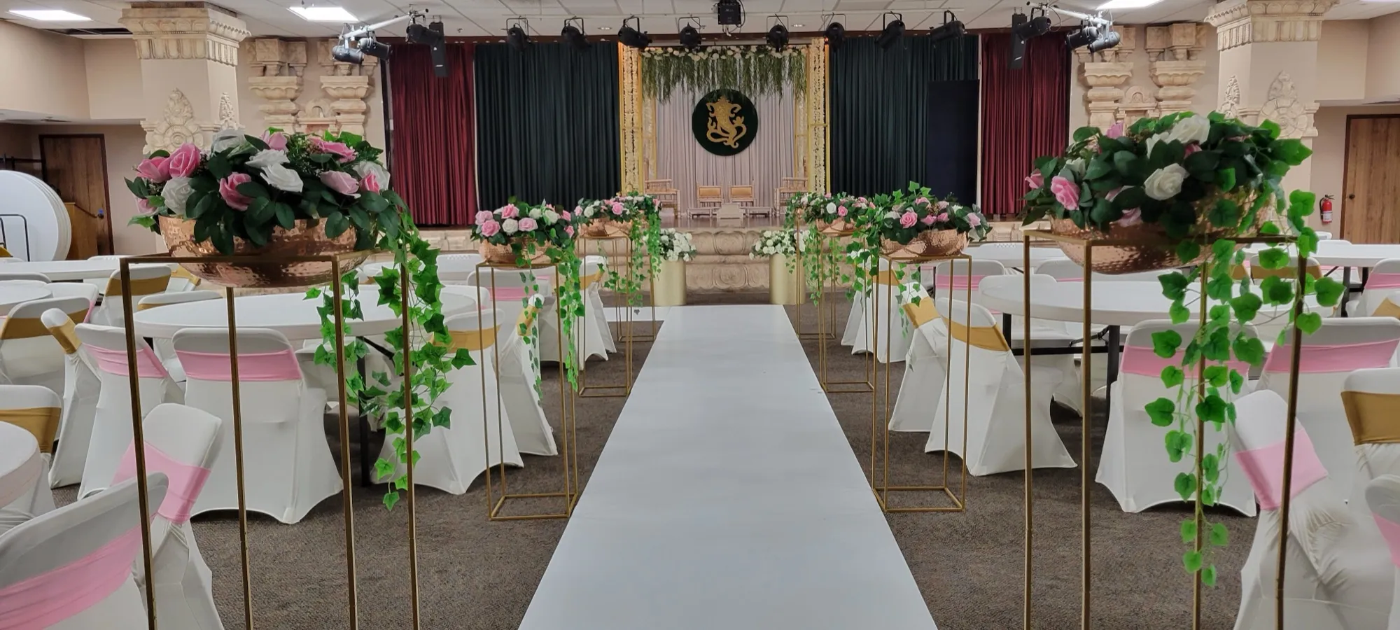 Venue wide aisle floral stands — Gold Frame Mandap in Green & White