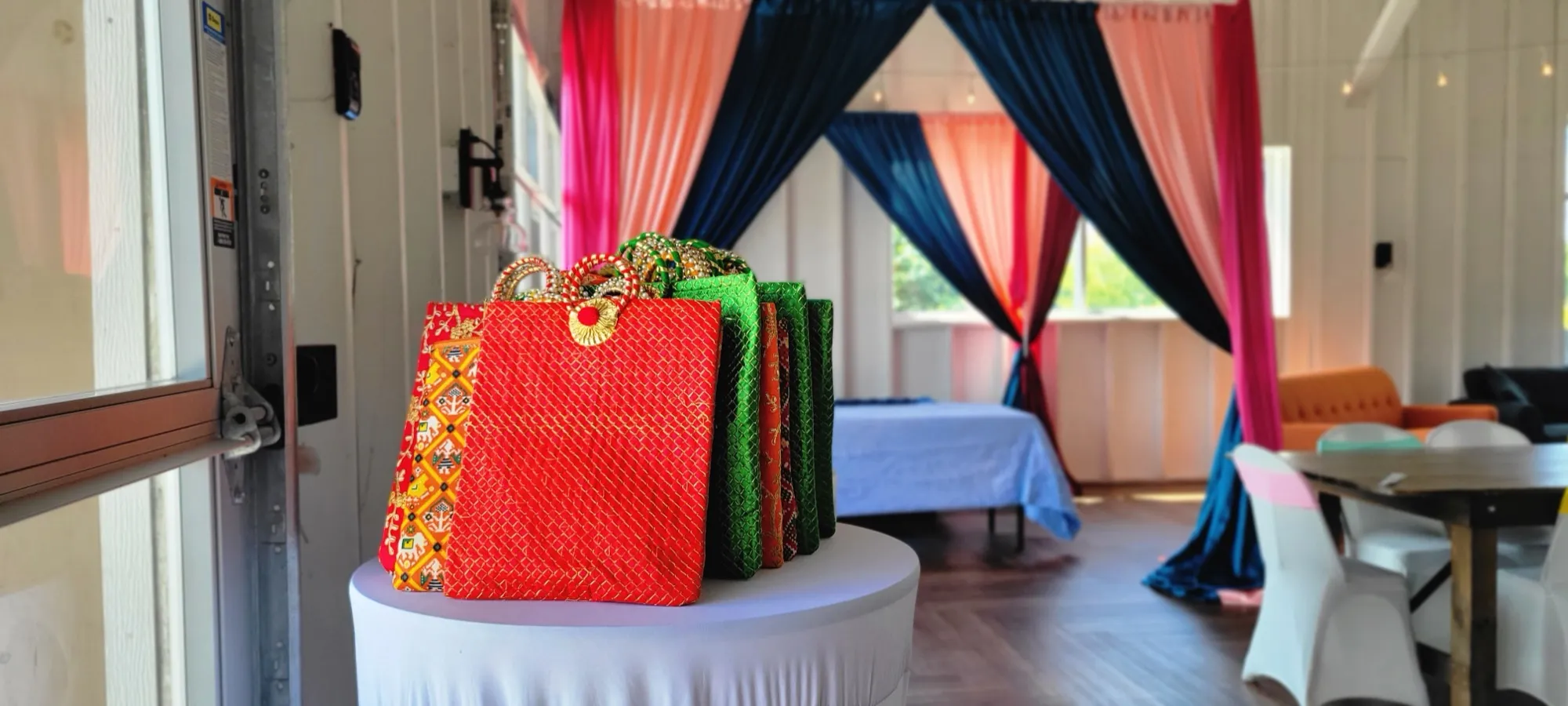 Venue entrance drape archway gift bags — Colorful Sangeet Stage with Diwan & Elephants