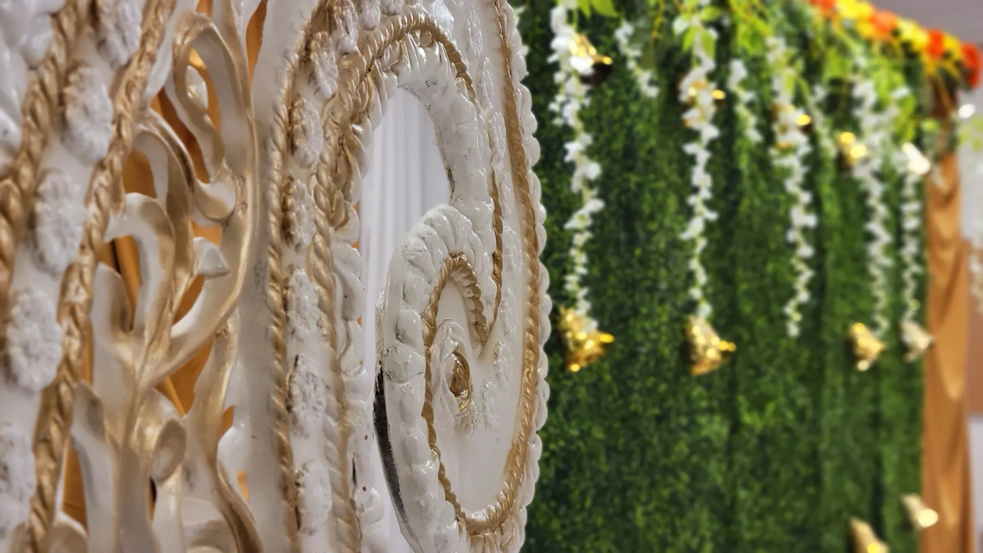 Paisley panel greenery wall detail — Traditional Gold & Marigold Mandap