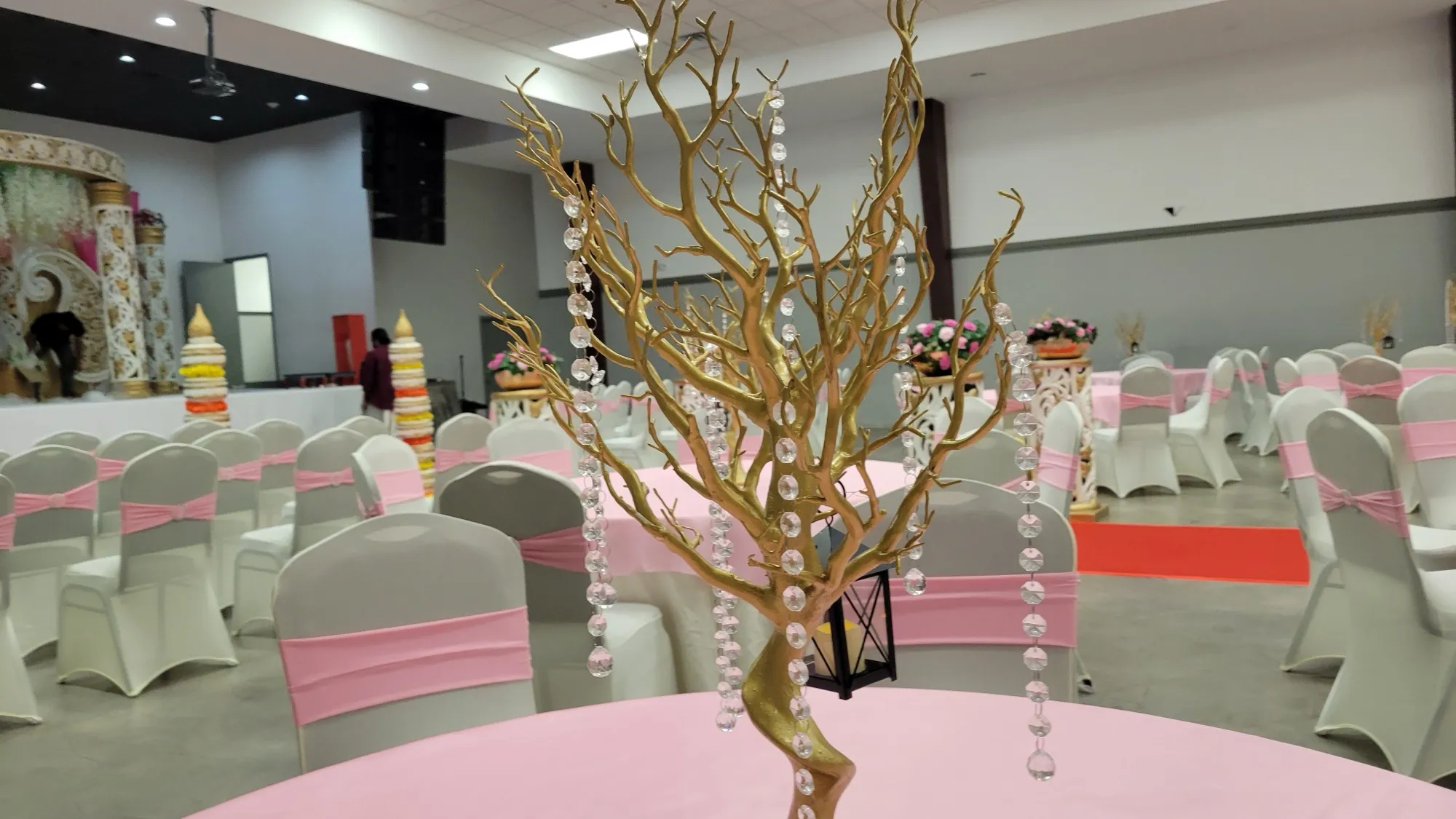 Table setting pink cloth gold charger — Pink Wisteria Mandap