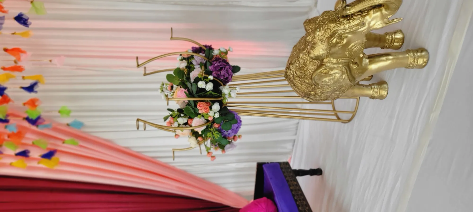 Gold hoop flower arrangement detail — Colorful Sangeet Stage with Diwan & Elephants